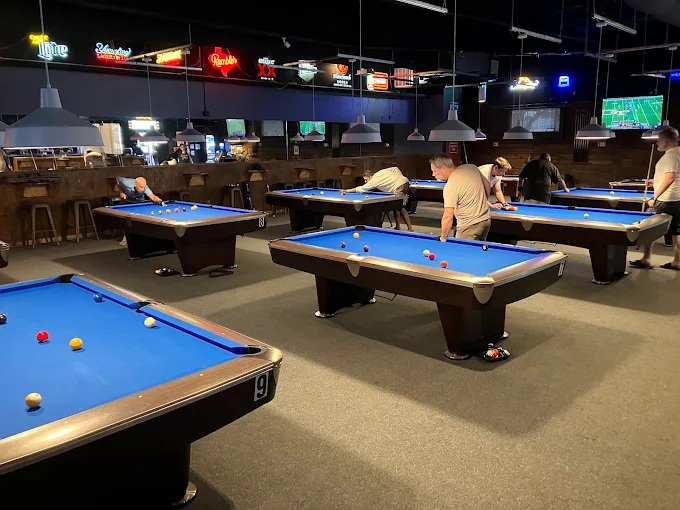 Players shooting pool at Mayfield's